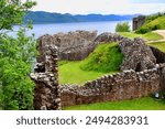 Urquhart Castle is a ruined castle that sits beside Loch Ness in the Highlands of Scotland.