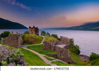 Urquhart Castle at sunset located on the banks of Loch ness, Scotland.