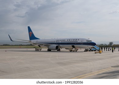 Urumqi.China-June 2021: Plane Of China Southern Airlines At Airport. Travellers Are Boarding. A Chinese Airline Company