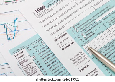 US 1040 Tax Form and silver ball pen