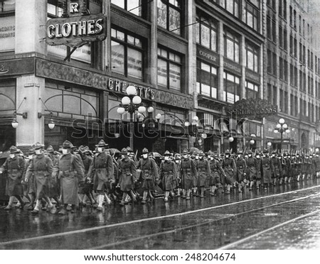 U.S. 39th regiment in Seattle, wear masks to prevent influenza. Dec. 1918. The soldiers were on their way to France during the 1918-19 'Spanish' Influenza pandemic.