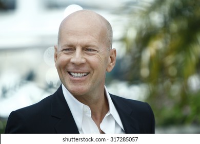 US actor Bruce Willis poses during the photocall of 'Moonrise Kingdom' at the 65th Cannes film festival on May 16, 2012 in Cannes