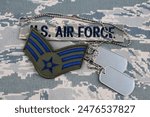 US AIR FORCE branch tape and Senior Airman rank patch and dog tags on digital tiger-stripe pattern Airman Battle Uniform