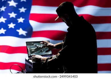 US Air Force unit responsible for USA air defense, relaying instructions to squadrons patrolling over borders. United States military expert uses laptop software to do monitoring - Powered by Shutterstock