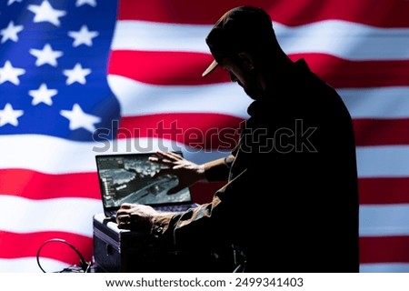 US Air Force unit responsible for USA air defense, relaying instructions to squadrons patrolling over borders. United States military expert uses laptop software to do monitoring