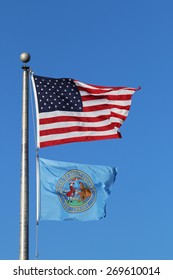 US American And Bergen County, NJ Flags Waving In The Wind With The Beautiful Blue Sky In Background.