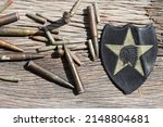 US Army 2ND INFANTRY DIVISION Brigade, Military Patch US Army Military Assistance Command and USA Flag Ammunition bulet on wood background - Image