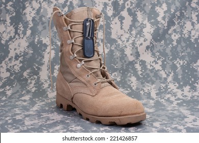 US ARMY Concept  - Camouflage Background With Desert Boots