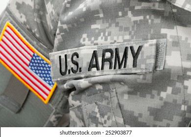 US Army And Flag Patch On Solder's Uniform