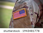 US Army Soldier and American Flag