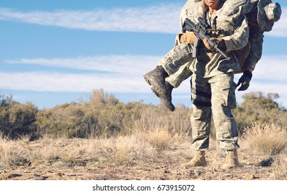 US Army Soldier Carrying Wounded Friend