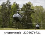 U.S. Army Soldiers provide transportation via UH-72A Lakotas for a sky-view tour of the Grafenwoehr Training Area during an orientation on environmental considerations hosted by the Training Support A