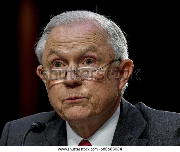 US. Attorney General Jeff Sessions reads from\
prepared answers in response to a question from one of the members\
of the Senate Intelligence Committee during his testimony\
Washington DC, June 13,\
2017.