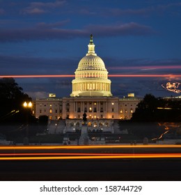 US Capitol Building With Car Lights Trails Foreground At Night 