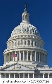 U.S. Capitol Dome  And Waving US National Flag Close-up - Washington D.C. United States Of America