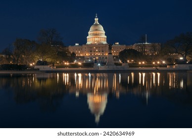 US Capitol Hill in Washington DC at night - Powered by Shutterstock