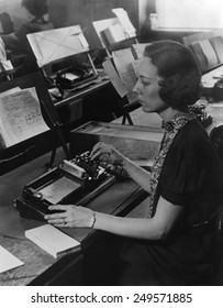 U.S. Census Worker Transferring Information From A Questionnaire To A Punch Card, Ca. 1940.