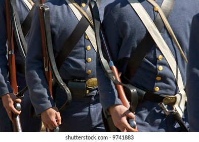 US Civil War Confederate re-enactors marching in formation