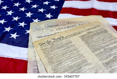 US Constitution With Bill Of Rights And Declaration Of Independence On An American Flag 