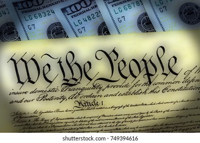 US Constitution with One Hundred Dollar Bills sitting above - National Debt Ceiling Concept