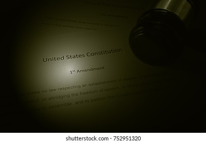 US Constitution text showing the first amendment, with legal gavel                                - Powered by Shutterstock