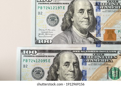 US currency, 100 dollars banknotes, one hundred dollars arranged symmetrically