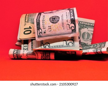 US Currency Bills On A Colorful Background. Business Finance Layout.