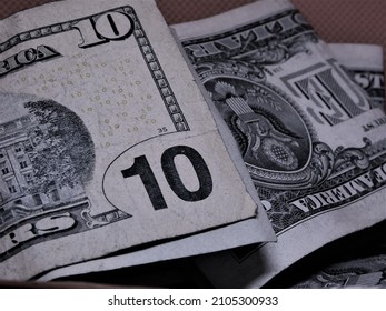 US Currency Bills On A Colorful Background. Business Finance Layout.