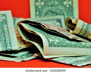 US Currency Bills On A Colorful Background. Business Finance Layout.