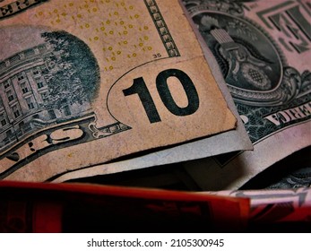 US Currency Bills On A Colorful Background. Business Finance Layout.