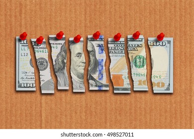 US Dollar Bill Cut In Pieces Suggesting Weak Economy