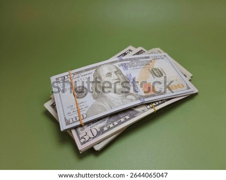 US Dollar Bills Spread on Table – Cash Flow, Income, Savings, Economic Transactions, and Currency Representation in Business and Finance. 
