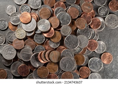 US Dollar Coins, Different Coins Piled Up. Dime, Quarter Penny Coins Background And Pattern