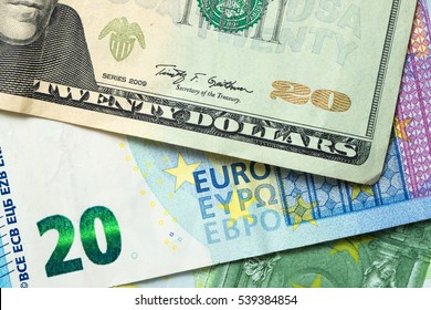 US dollar and Euro banknotes forming background