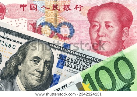 US Dollar, Euro and Yuan currency banknotes. economical war concept
