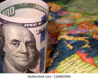 US Dollar On The Europe Map Background. Concept For Trade Between The United States And Europe, American Investment And Domination In EU, Exchange Rate