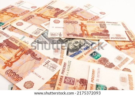 US Dollar and Russian ruble. Currency exhange. Economic crisis. Rouble dollar cash. Hundred dollar bill and 5000 rubles. Business and finance. Russia and USA