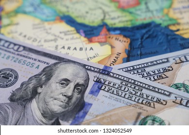 US Dollars On The Map Of Saudi Arabia. American Investment And Trading With The Persian Gulf Countries, Arabian Economy, Oil Industry