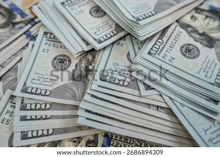 US dollars stack macro view representing business profit, economic power, investment and wealth concept