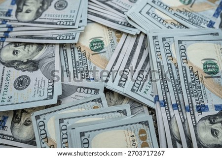 US dollars stack macro view representing business profit, economic power, investment and wealth concept