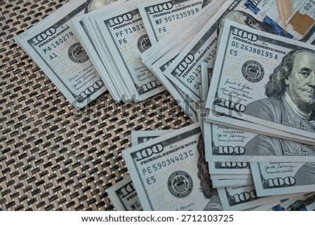 US dollars stack macro view representing business profit, economic power, investment and wealth concept