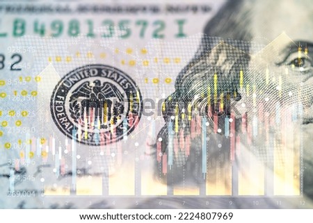 US economy. Financial market of America. Charts next to a portrait of Franklin. Concept - economists forecast for the United States. US government bonds.economy,funds concept