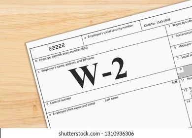 A US Federal Tax W2 Income Tax Form On A Desk