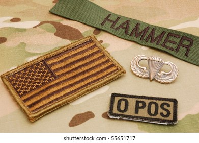 US Flag, Name Tag, Blood Type Patch And Jump Wings On Multicam Camo Background