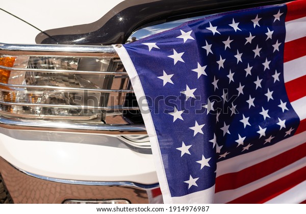 US flag on car\
trunk