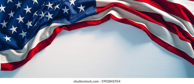 US Flag On White Paint Texture. 4th Of July USA Independence Day Banner Copy Space