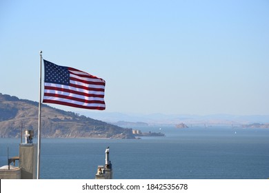 US Flag over water, SF bay