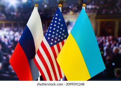 The US Flag, Russian Flag, Ukraine Flag. Flag Of USA, Russia, Ukraine. The United States Of America And The Russian Federation Confrontation. Russia's Invasion Of Ukraine