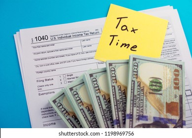 U.S. Individual Income Tax Return. TAX DEDUCTIONS And Individual Tax Return Form 1040 With Money On Table. Lodging Your Tax Return.