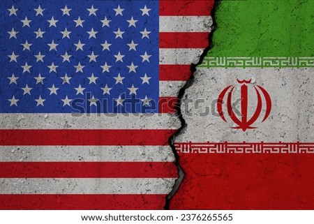 US and Iran flags on broken concrete